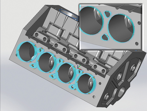 Robot toolpaths generated on a 3D CAD model of a mechanical part within Robotmaster software.